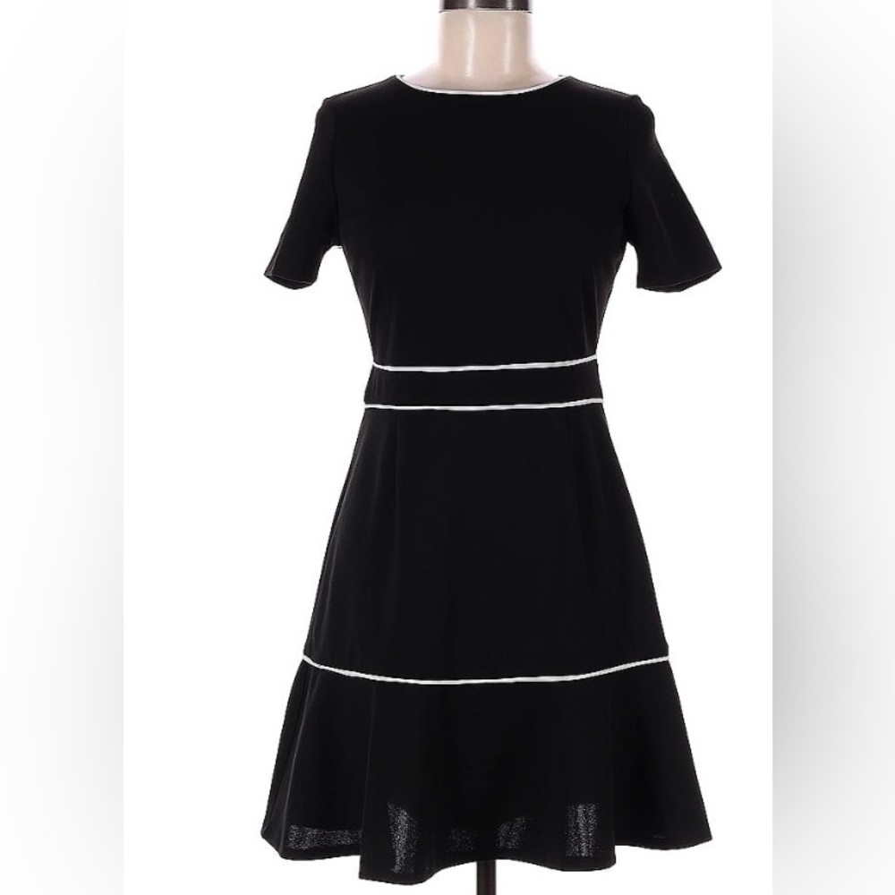 AQUA From Bloomingdales. Black with white trim. Size medium. Fitted with stretch